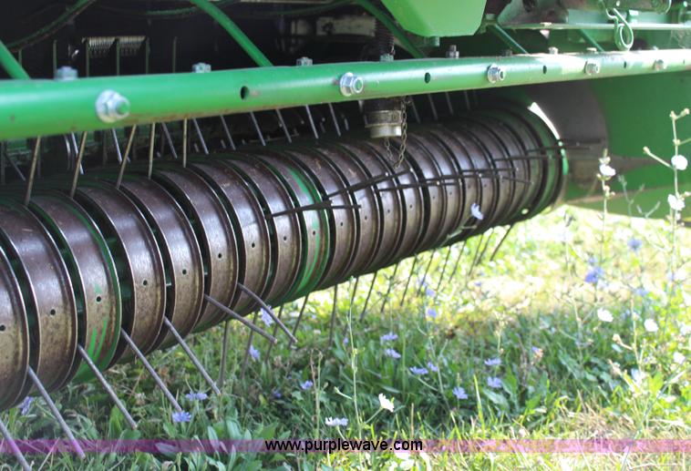 image for item J2008 2003 John Deere 567 round baler