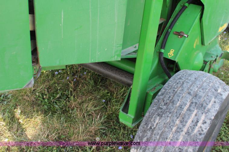 image for item J2008 2003 John Deere 567 round baler