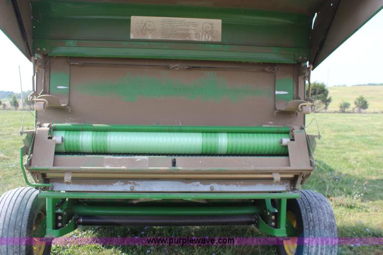 image for item J2008 2003 John Deere 567 round baler