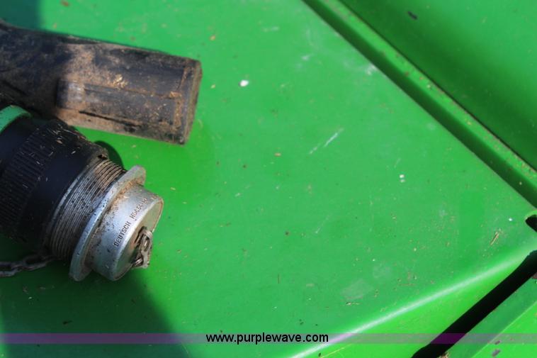 image for item J2008 2003 John Deere 567 round baler