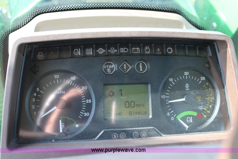 image for item J2026 2005 John Deere 7320 MFWD tractor