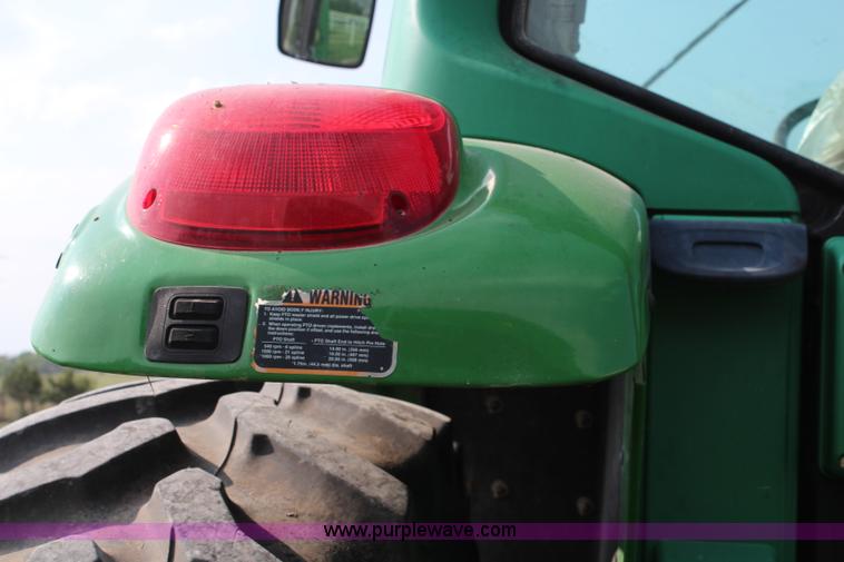 image for item J2026 2005 John Deere 7320 MFWD tractor