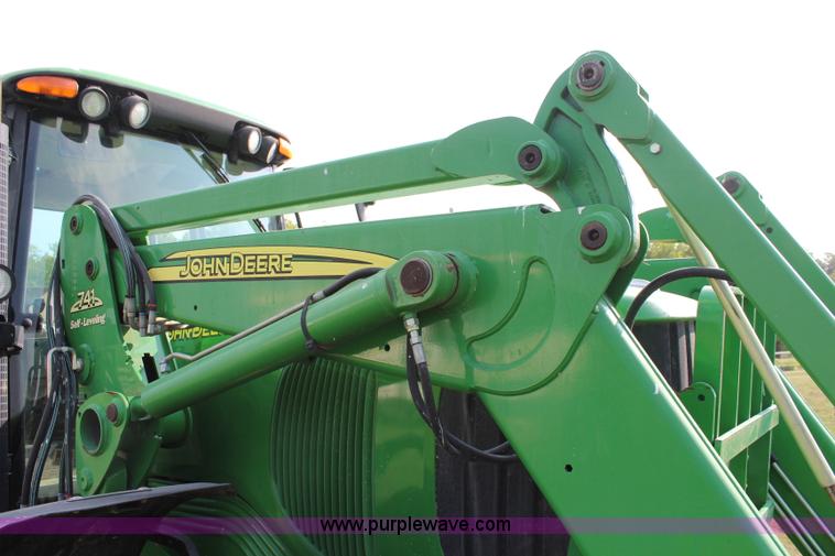 image for item J2026 2005 John Deere 7320 MFWD tractor