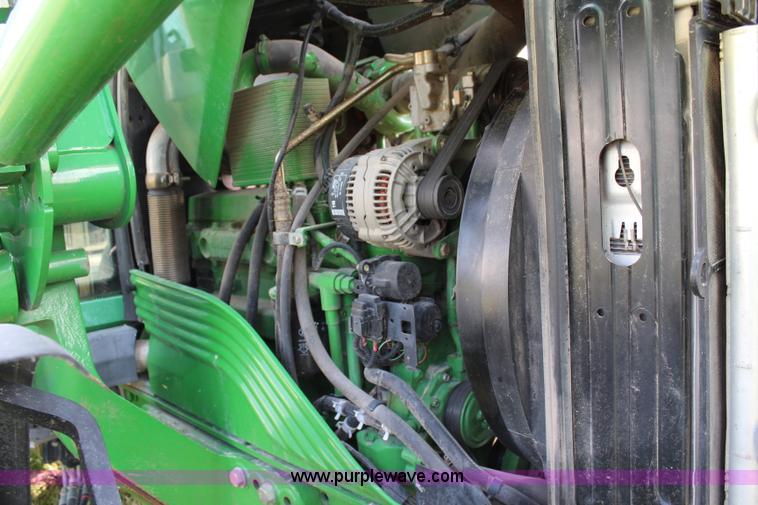 image for item J2026 2005 John Deere 7320 MFWD tractor