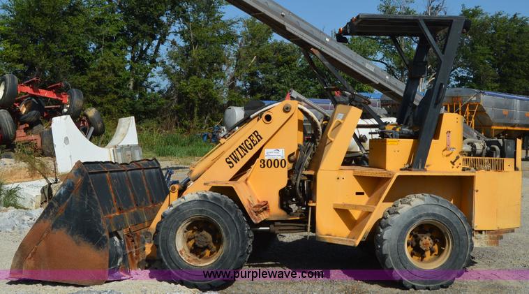 image for item H2754 2002 NMC-Wollard Swinger 3000 wheel loader