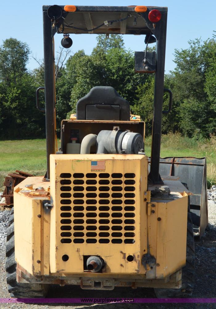 image for item H2754 2002 NMC-Wollard Swinger 3000 wheel loader