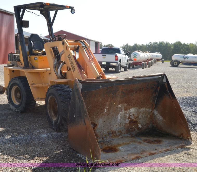 image for item H2754 2002 NMC-Wollard Swinger 3000 wheel loader