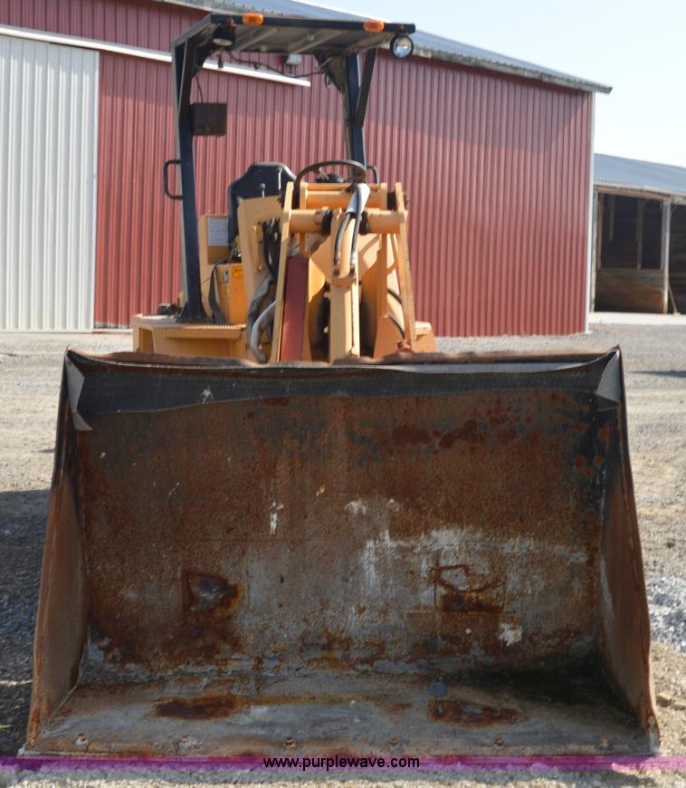 image for item H2754 2002 NMC-Wollard Swinger 3000 wheel loader