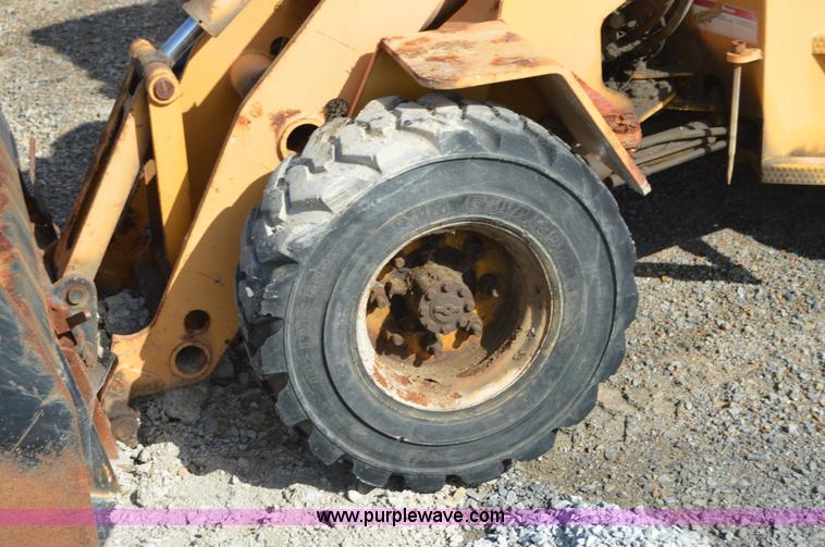 image for item H2754 2002 NMC-Wollard Swinger 3000 wheel loader