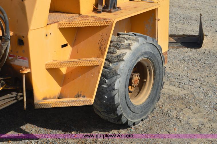 image for item H2754 2002 NMC-Wollard Swinger 3000 wheel loader