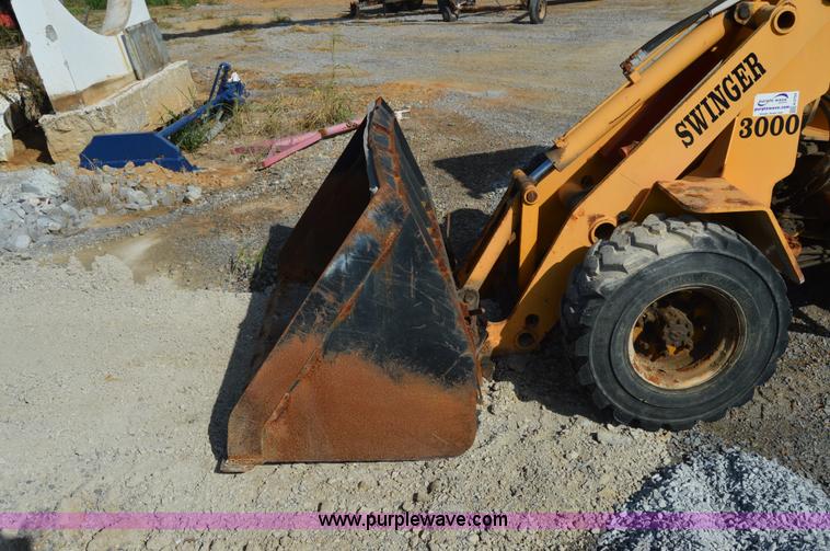 image for item H2754 2002 NMC-Wollard Swinger 3000 wheel loader
