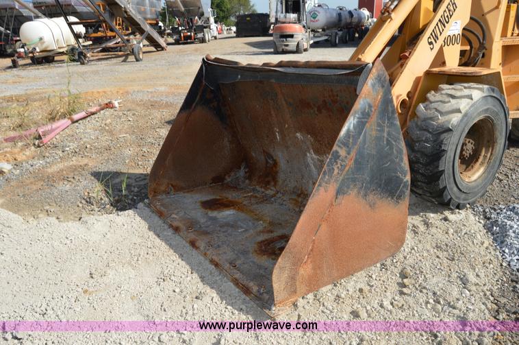 image for item H2754 2002 NMC-Wollard Swinger 3000 wheel loader