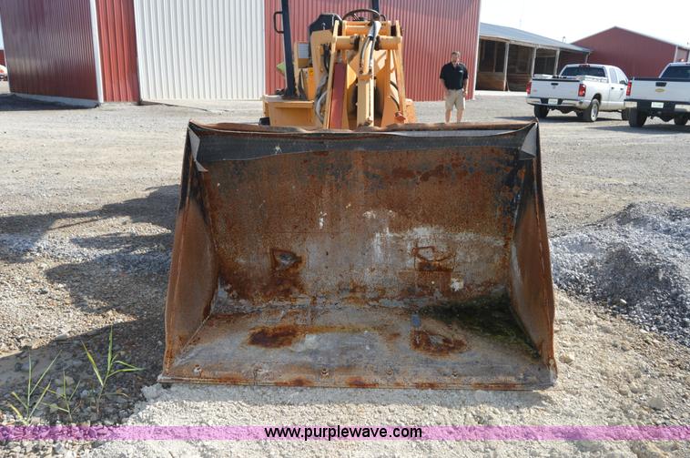 image for item H2754 2002 NMC-Wollard Swinger 3000 wheel loader