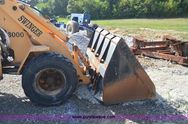 image for item H2754 2002 NMC-Wollard Swinger 3000 wheel loader