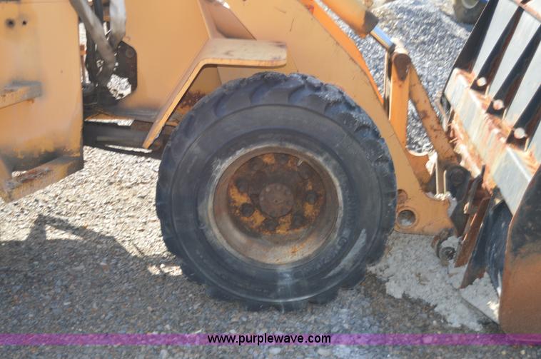 image for item H2754 2002 NMC-Wollard Swinger 3000 wheel loader