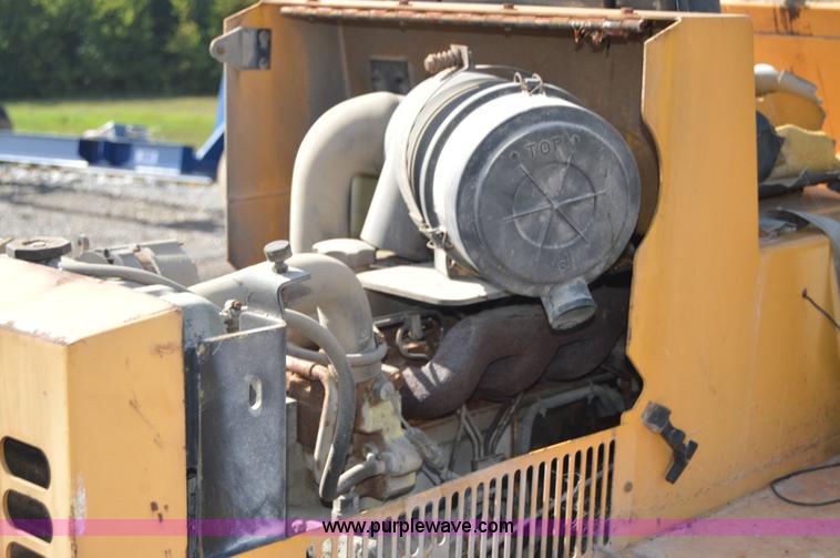 image for item H2754 2002 NMC-Wollard Swinger 3000 wheel loader