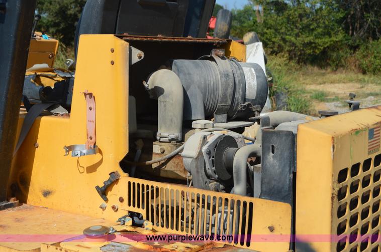 image for item H2754 2002 NMC-Wollard Swinger 3000 wheel loader