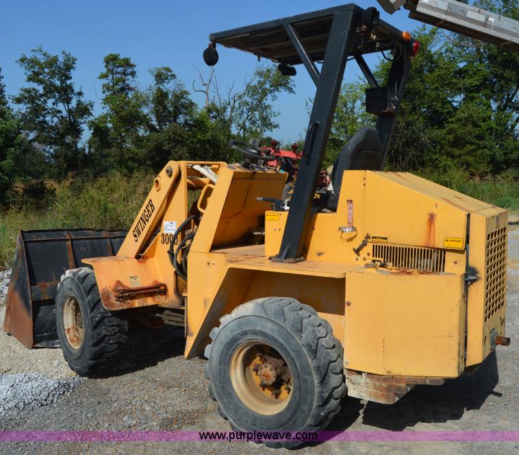 image for item H2754 2002 NMC-Wollard Swinger 3000 wheel loader