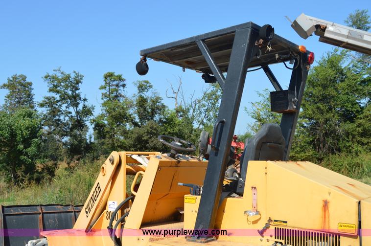 image for item H2754 2002 NMC-Wollard Swinger 3000 wheel loader