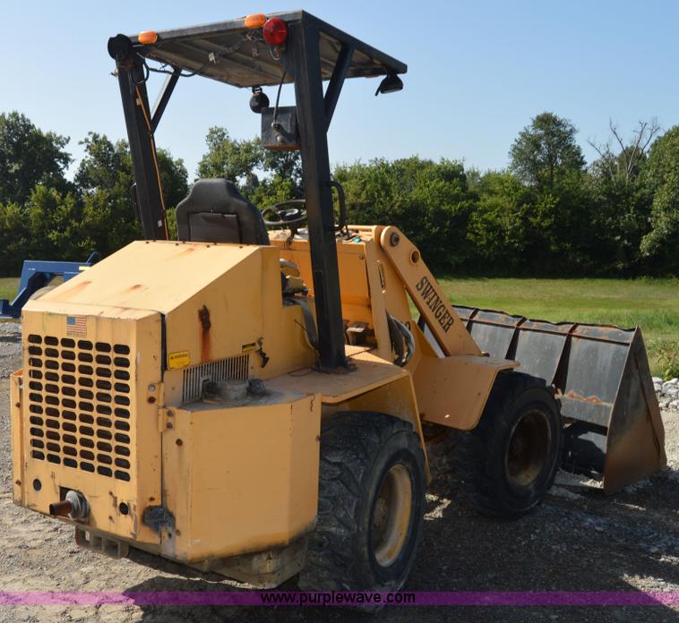 image for item H2754 2002 NMC-Wollard Swinger 3000 wheel loader