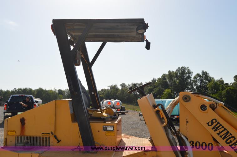 image for item H2754 2002 NMC-Wollard Swinger 3000 wheel loader