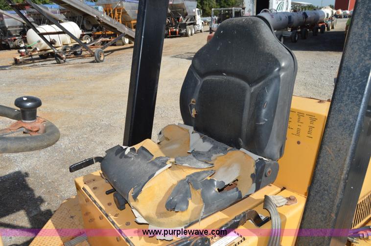 image for item H2754 2002 NMC-Wollard Swinger 3000 wheel loader