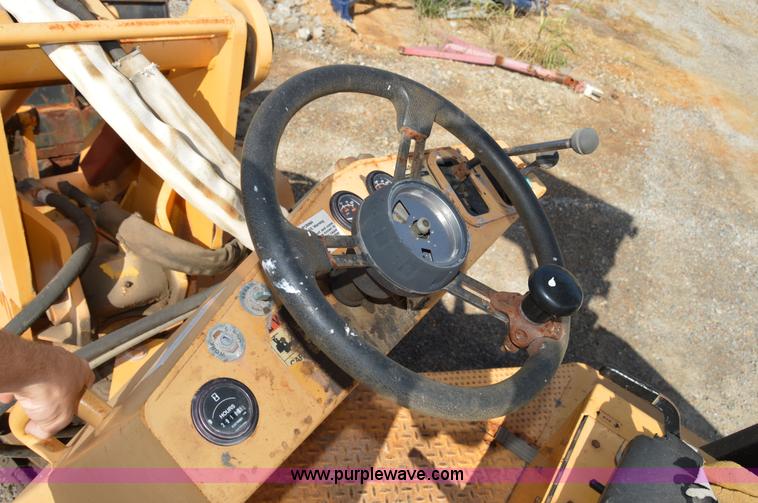 image for item H2754 2002 NMC-Wollard Swinger 3000 wheel loader