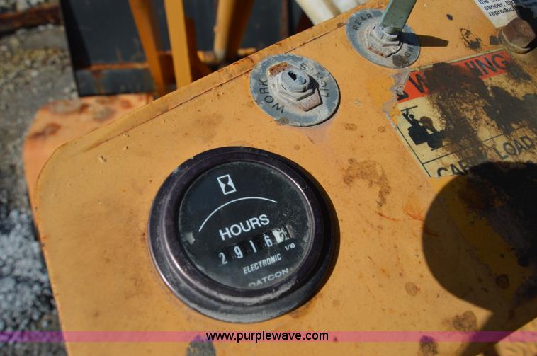 image for item H2754 2002 NMC-Wollard Swinger 3000 wheel loader