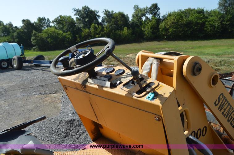 image for item H2754 2002 NMC-Wollard Swinger 3000 wheel loader