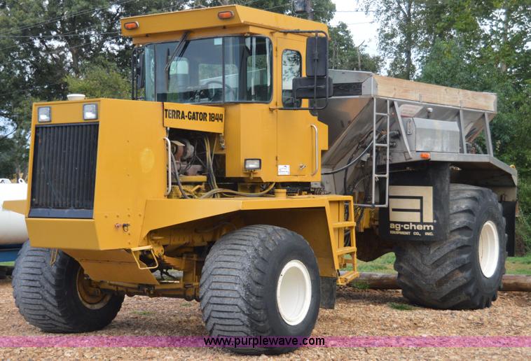 image for item H2757 1998 Ag-Chem TerraGator 1844 self-propelled dry spreader applicator