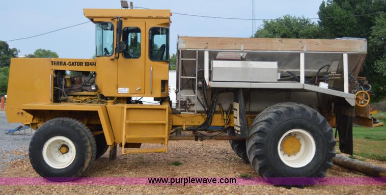 image for item H2757 1998 Ag-Chem TerraGator 1844 self-propelled dry spreader applicator