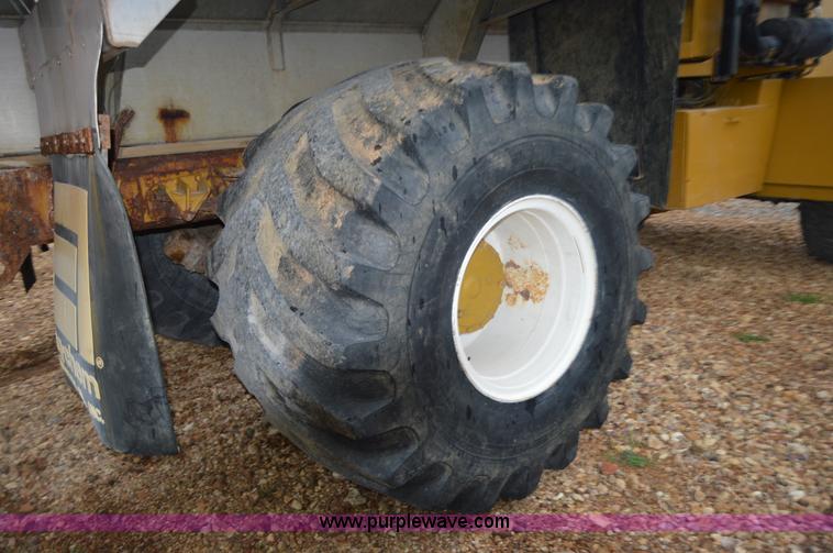 image for item H2757 1998 Ag-Chem TerraGator 1844 self-propelled dry spreader applicator