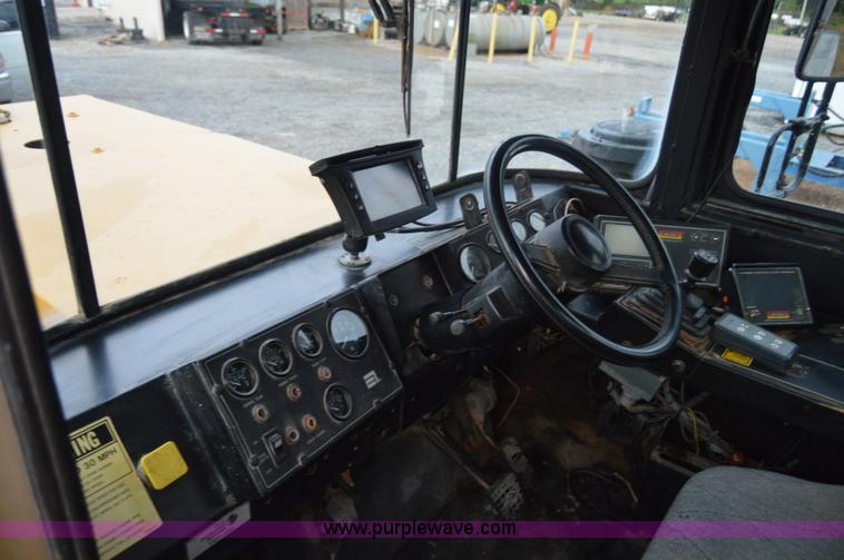 image for item H2757 1998 Ag-Chem TerraGator 1844 self-propelled dry spreader applicator