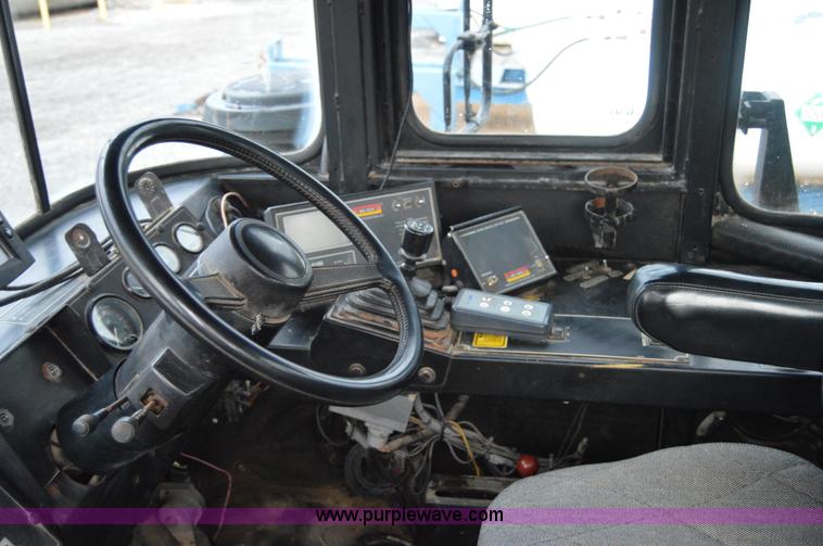 image for item H2757 1998 Ag-Chem TerraGator 1844 self-propelled dry spreader applicator