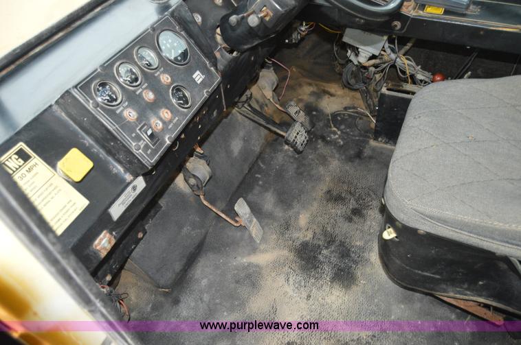 image for item H2757 1998 Ag-Chem TerraGator 1844 self-propelled dry spreader applicator