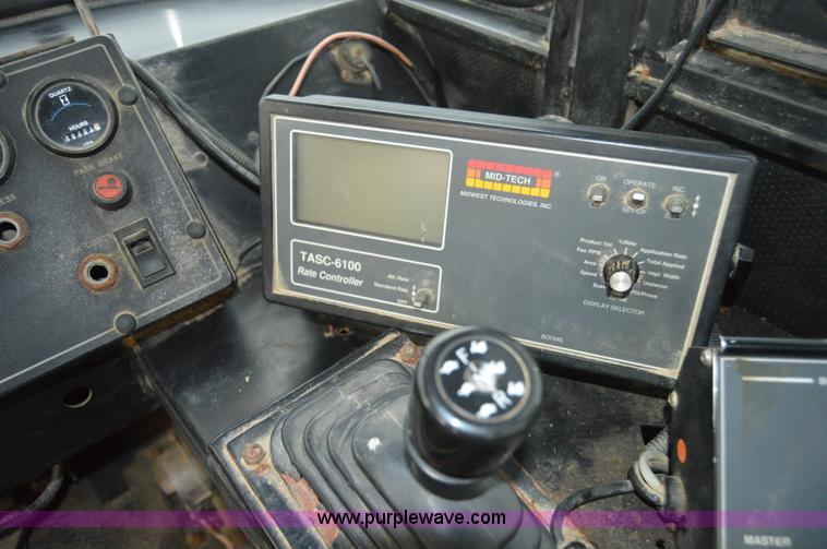 image for item H2757 1998 Ag-Chem TerraGator 1844 self-propelled dry spreader applicator