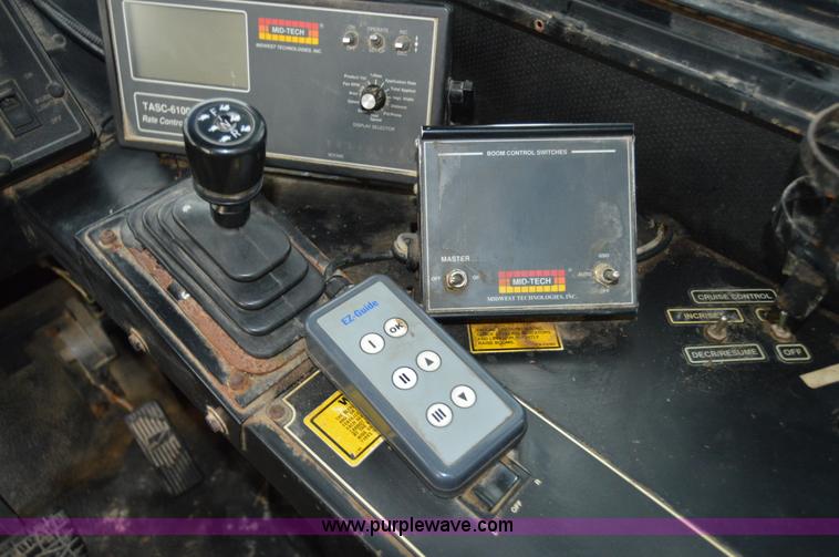 image for item H2757 1998 Ag-Chem TerraGator 1844 self-propelled dry spreader applicator