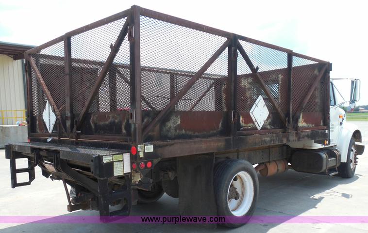 image for item I3383 2000 International 4700 Lo-Profile flatbed truck
