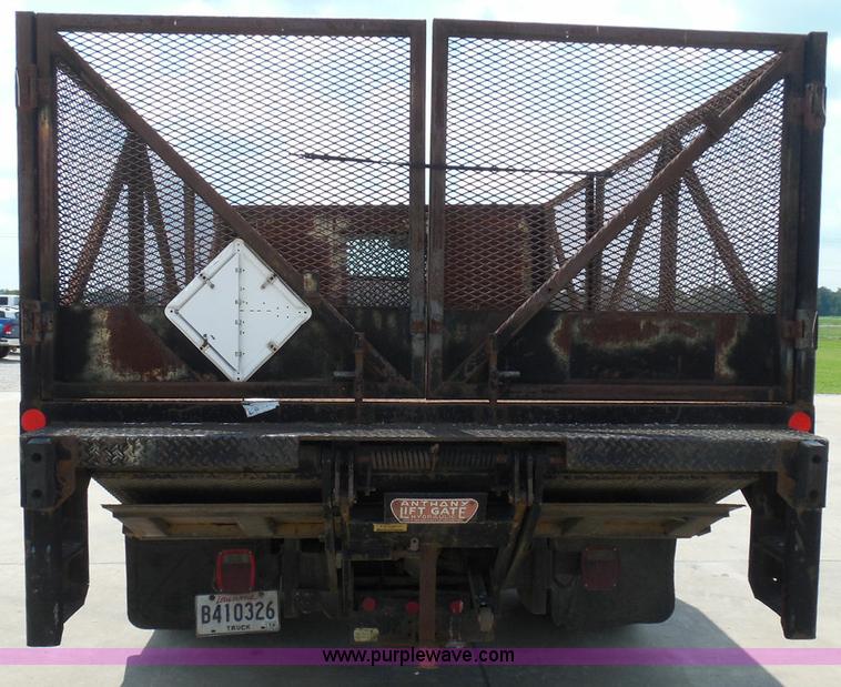 image for item I3383 2000 International 4700 Lo-Profile flatbed truck