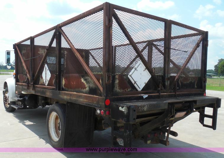 image for item I3383 2000 International 4700 Lo-Profile flatbed truck