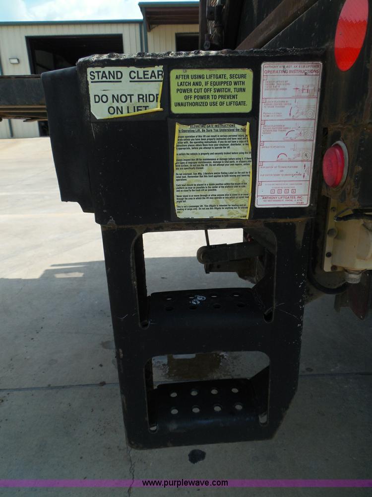 image for item I3383 2000 International 4700 Lo-Profile flatbed truck