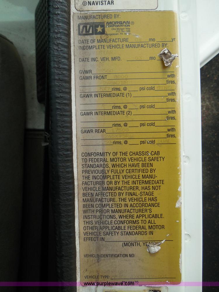 image for item I3383 2000 International 4700 Lo-Profile flatbed truck