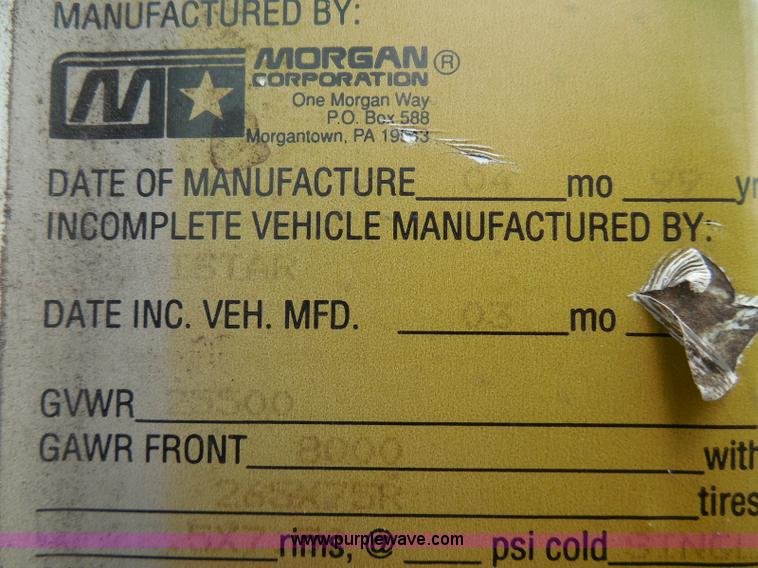 image for item I3383 2000 International 4700 Lo-Profile flatbed truck