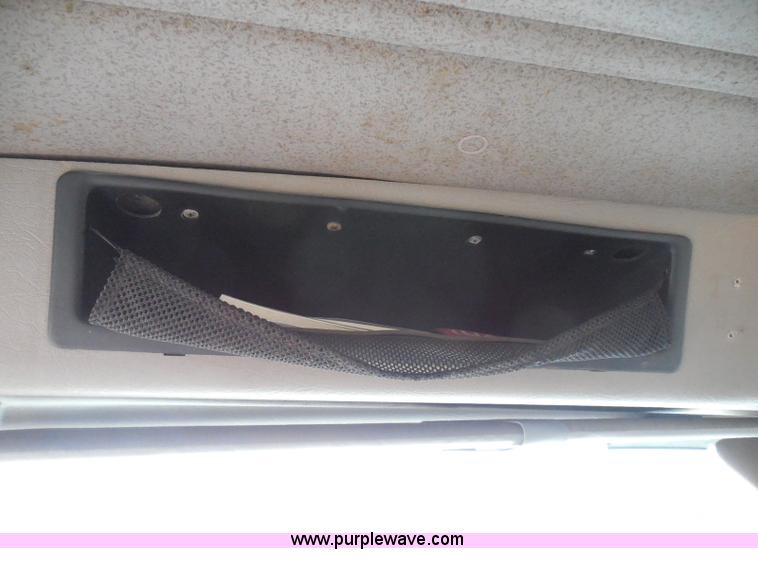 image for item I3383 2000 International 4700 Lo-Profile flatbed truck