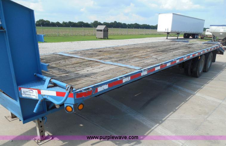 image for item I3387 1999 CFS Welding Services gooseneck flatbed trailer