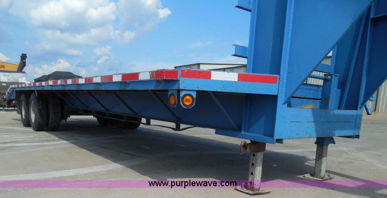 image for item I3387 1999 CFS Welding Services gooseneck flatbed trailer