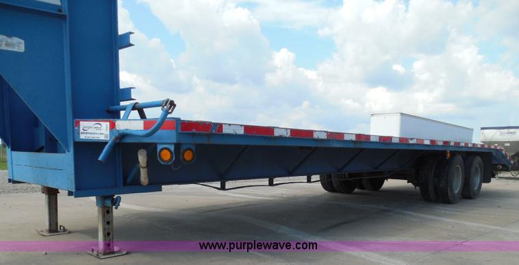 image for item I3387 1999 CFS Welding Services gooseneck flatbed trailer