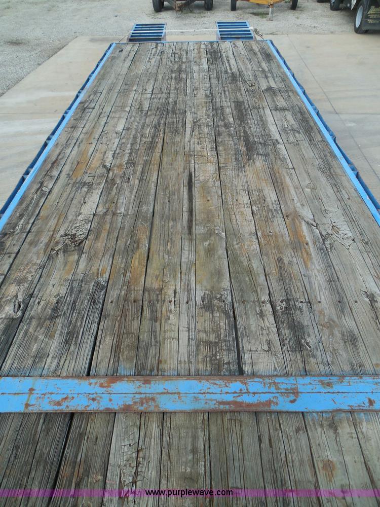 image for item I3387 1999 CFS Welding Services gooseneck flatbed trailer