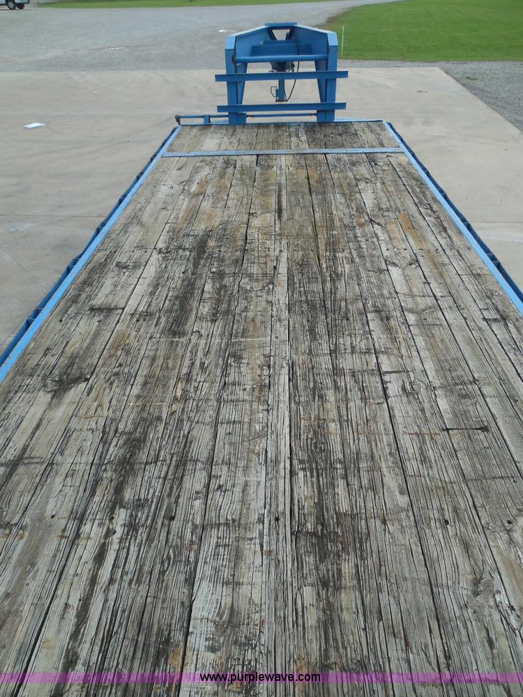 image for item I3387 1999 CFS Welding Services gooseneck flatbed trailer