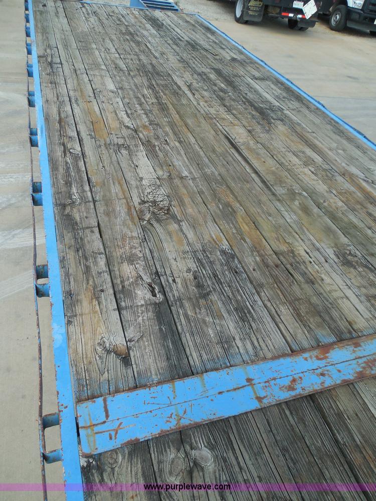 image for item I3387 1999 CFS Welding Services gooseneck flatbed trailer